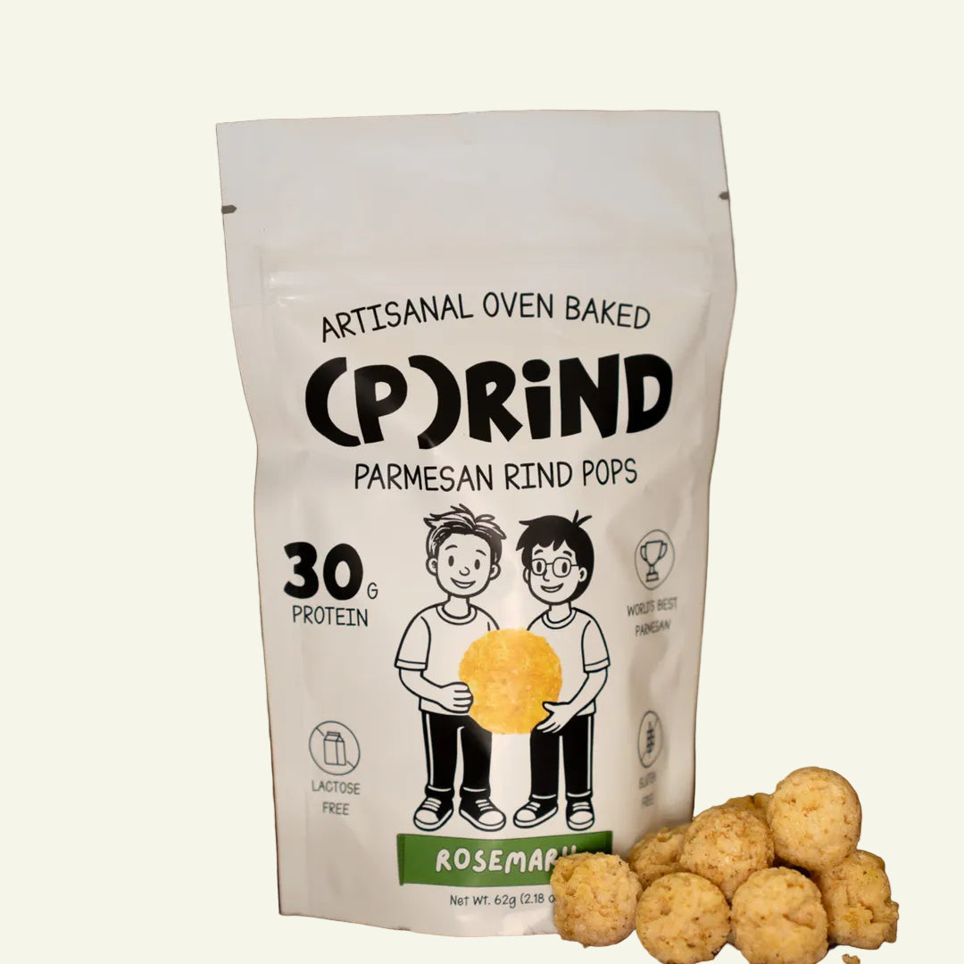 Packaging of Artisanal Oven Baked Parmesan Rind Pops with product on a wooden surface