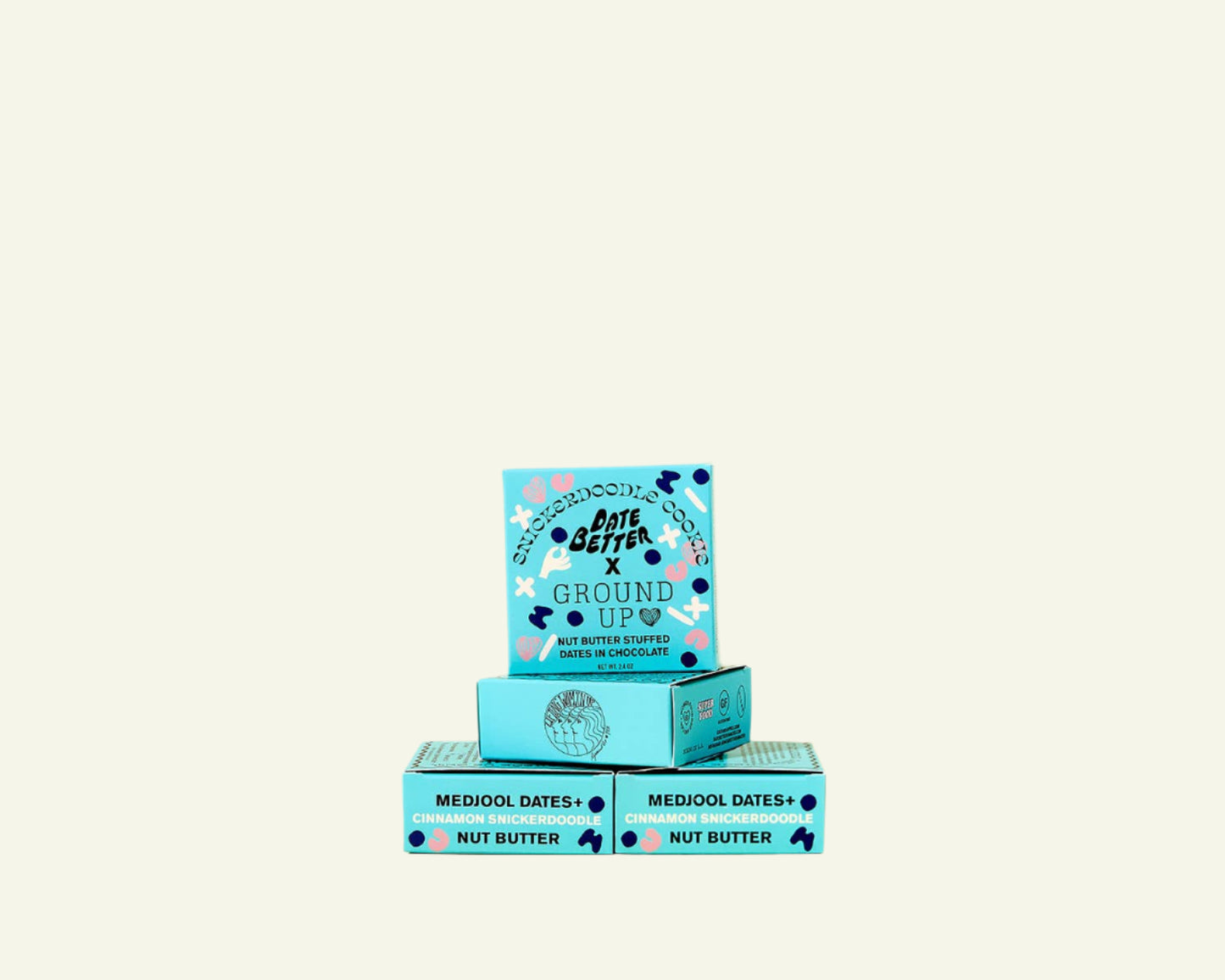 Three boxes of 'The Good Bar' on a beige background