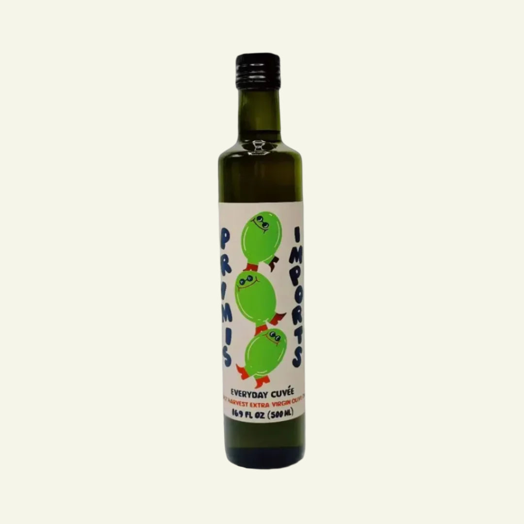 Bottle of olive oil with a label featuring green illustrations on a white background