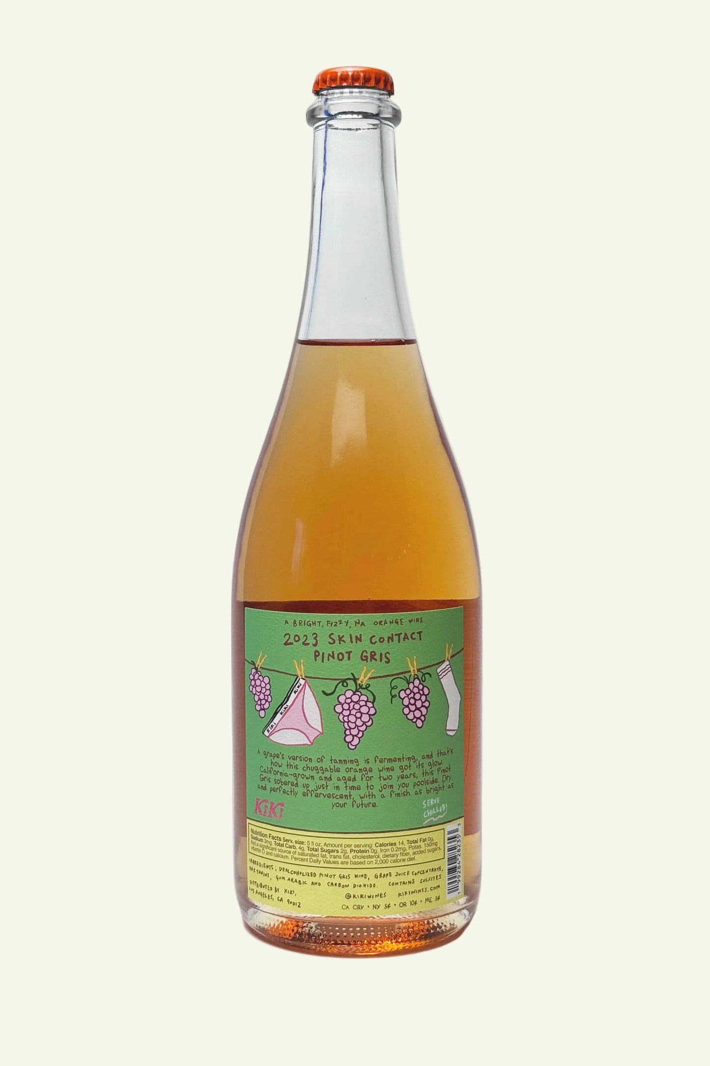 Bottle of fruit juice with a green label on a white background