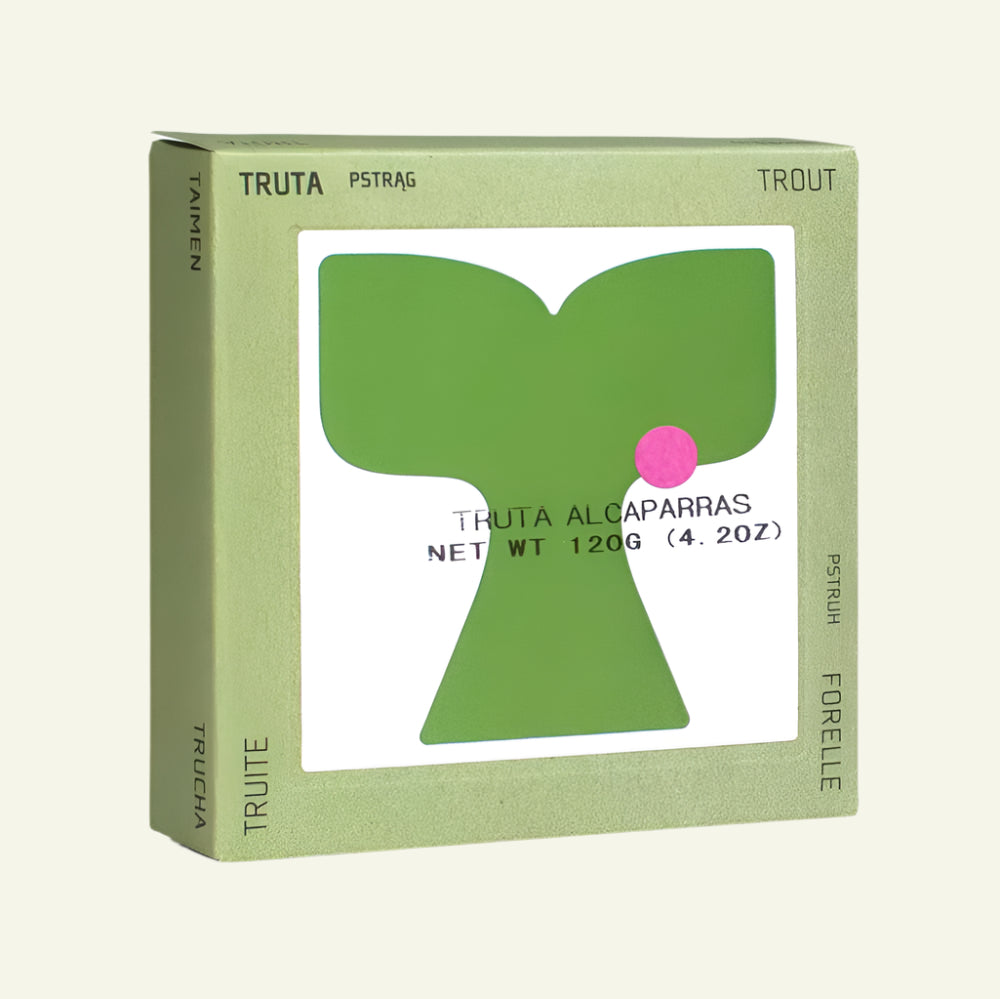 Green packaging box with a green leaf design and pink center on a white background