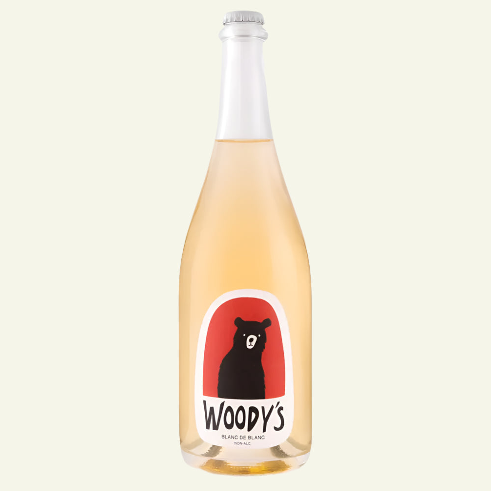 Bottle of Woody's wine with a bear label on a white background