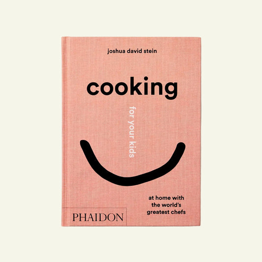 Book titled 'Cooking for Your Kids' by Joshua David Stein on a white background