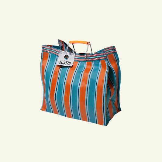A hand-woven striped tote bag in orange and blue with strong aluminum handles, displayed against a white background.