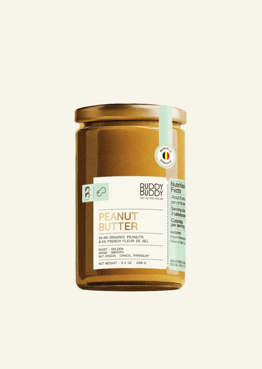 Jar of Buddy Buddy peanut butter on a white background