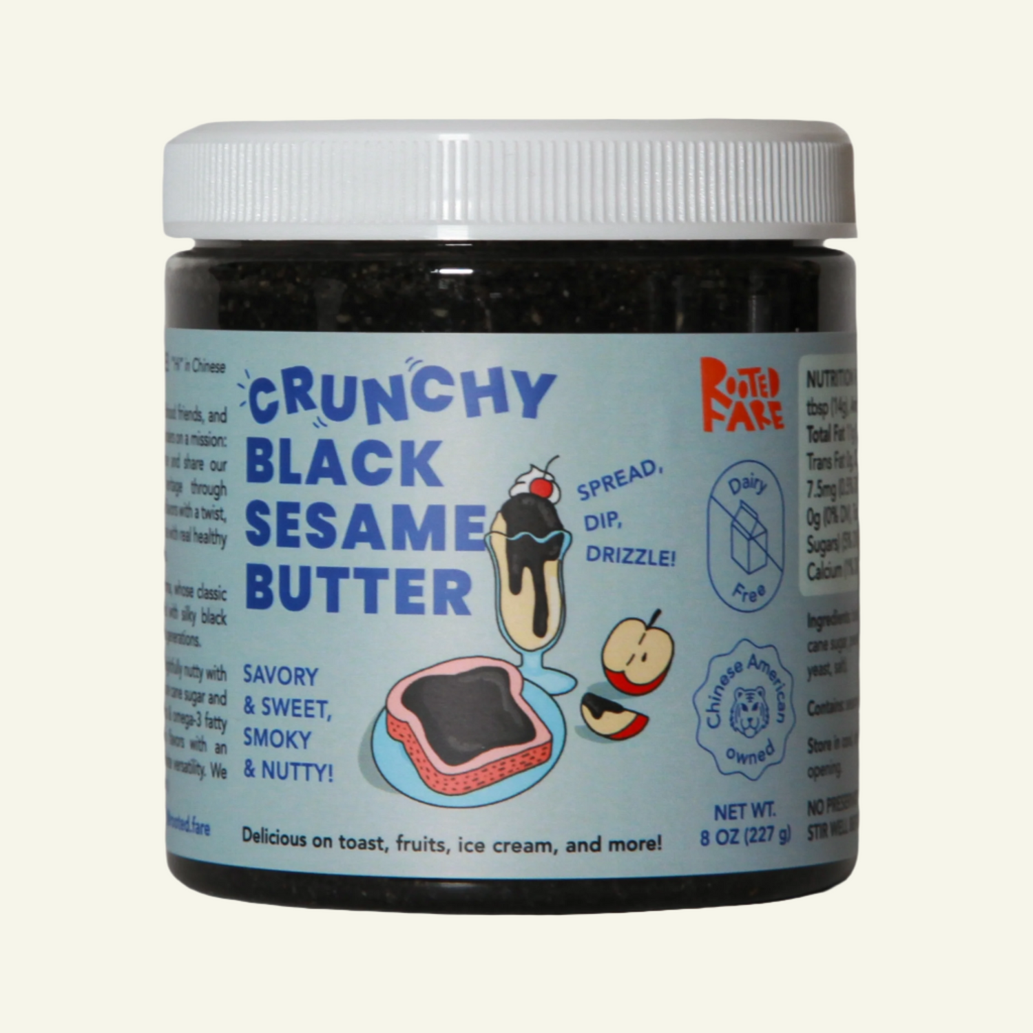 A jar of Crunchy Black Sesame Butter with a white lid. The label shows the product name and an illustration of a spoon with sesame butter, spread on a piece of toast.