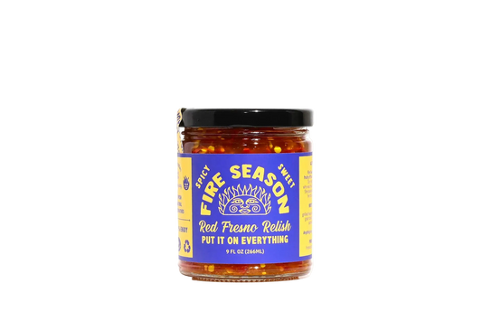 Jar of Fire Season hot sauce with a blue label on a white background