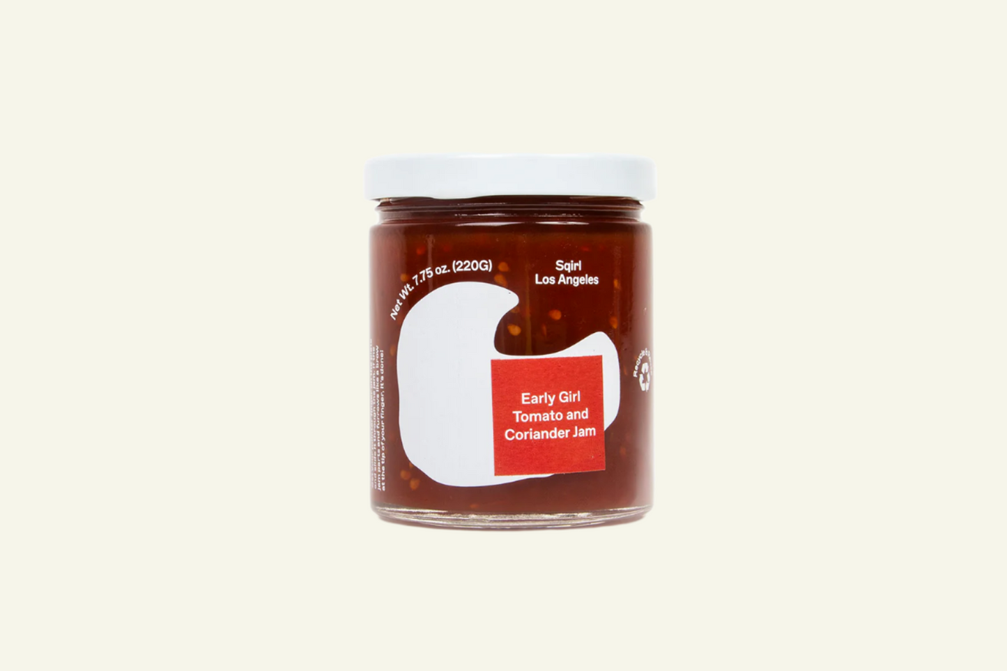 Jar of jam with a red label on a white background