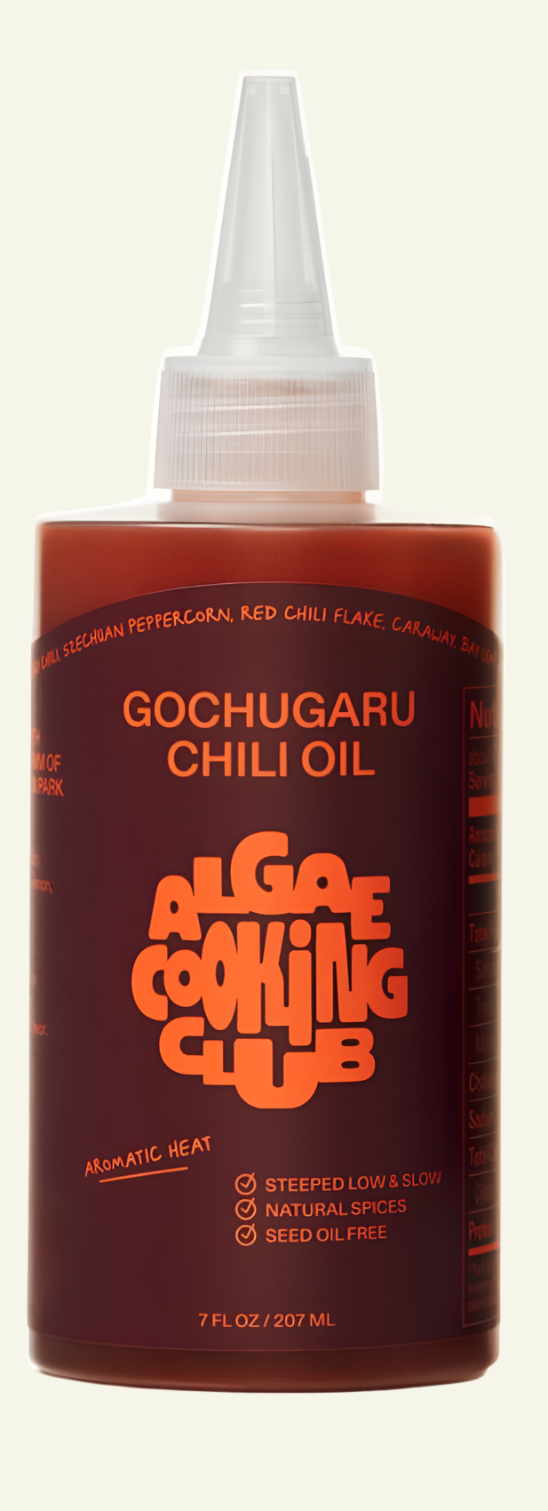 Bottle of Gochugaru Chili Oil from Algae Cooking Club on a white background.