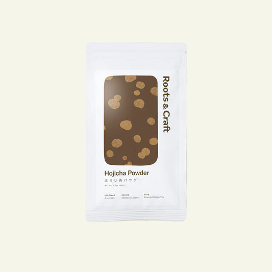 Roots & Craft Hojicha Powder package on a gray background