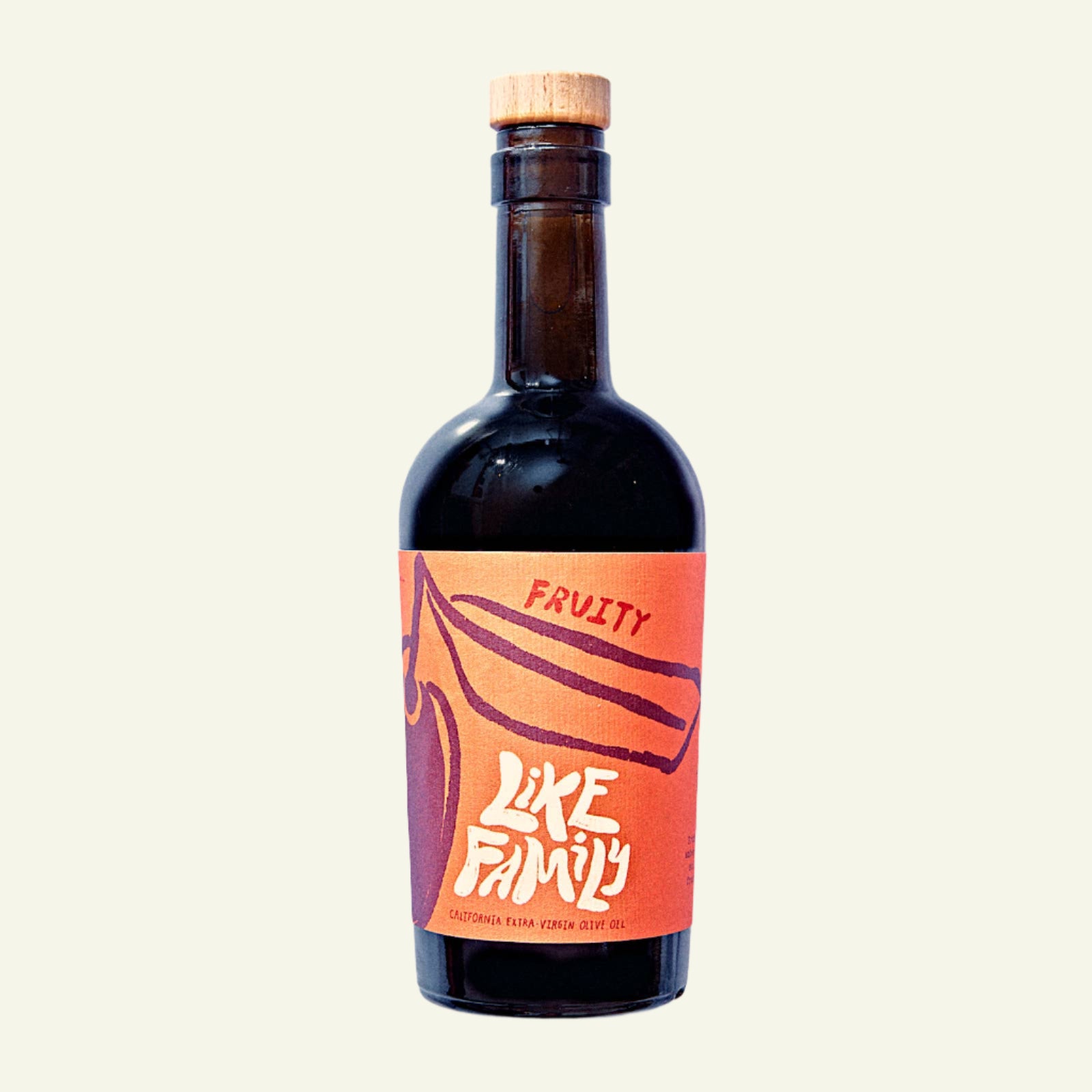 A bottle of Fruity extra virgin olive oil with a label that has a graphic of a fruit and the text 'FRUITY'. The background is marble-patterned.