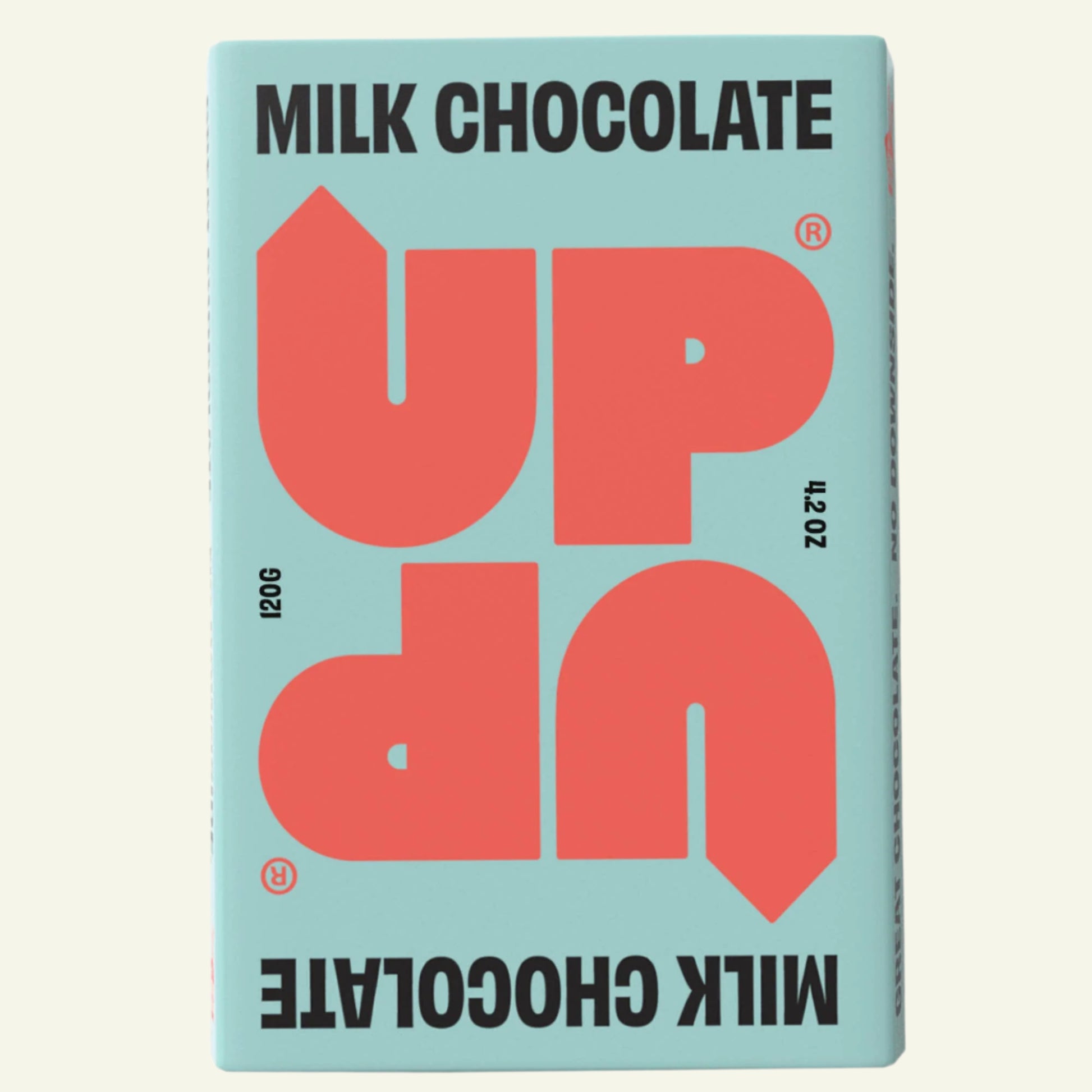 Milk chocolate bar packaging with 'UP' branding on a light blue background