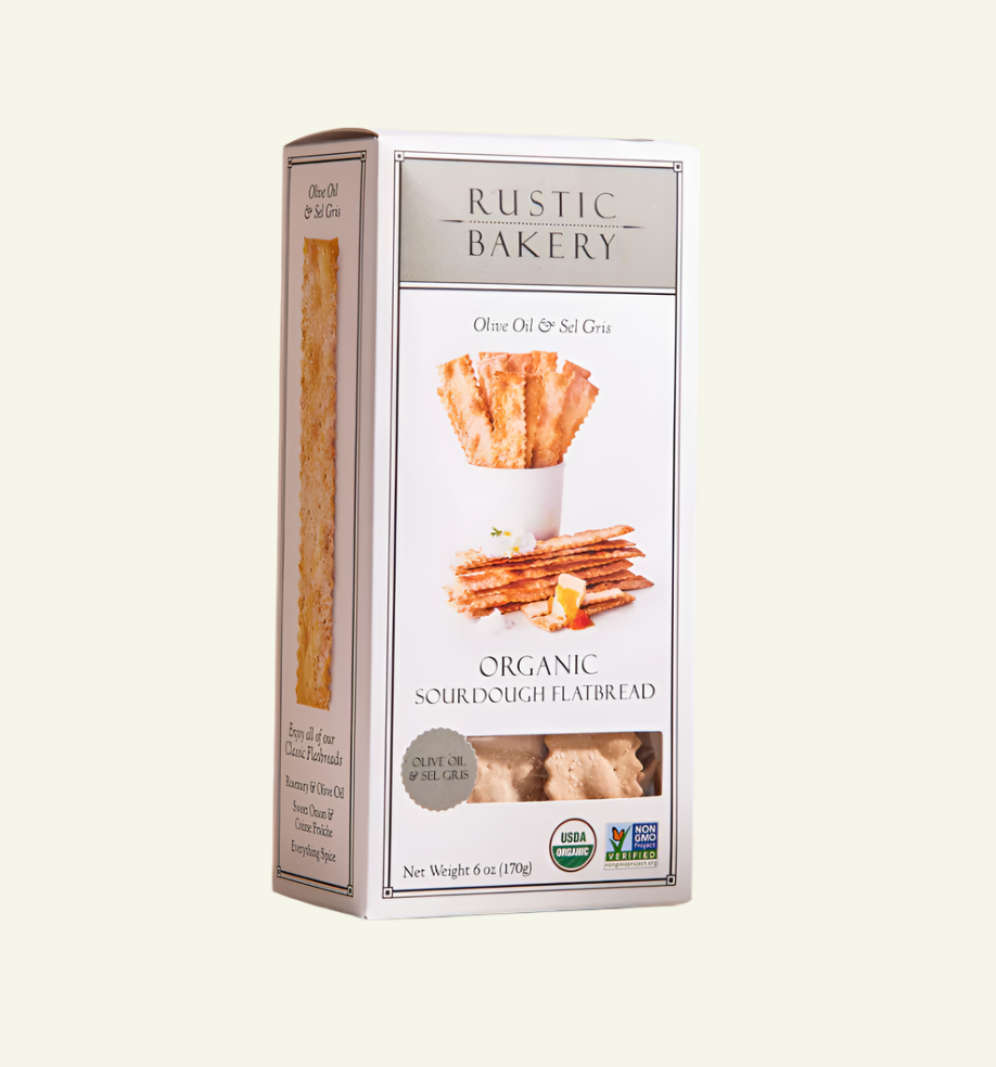 Box of Rustic Bakery organic sourdough flatbread on a beige background