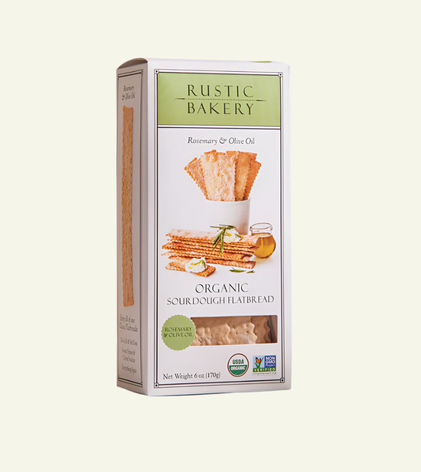 Box of Rustic Bakery organic sourdough flatbread on a beige background
