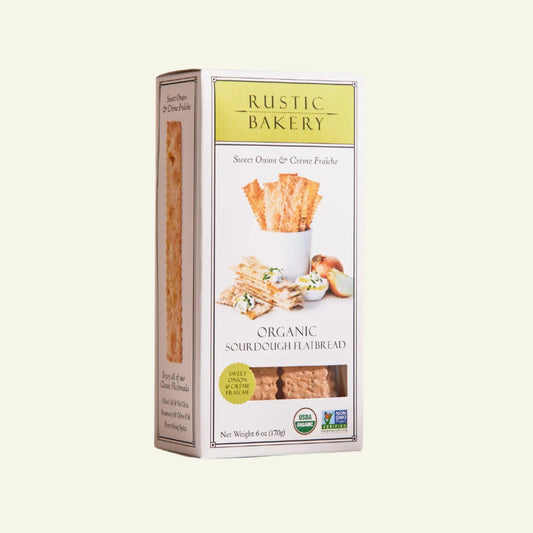 Box of Rustic Bakery organic sourdough flatbread on a beige background