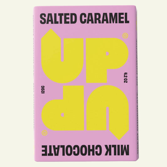 A package of Salted Caramel Milk Chocolate bar, 120G/4.2OZ with yellow text on a pink background.