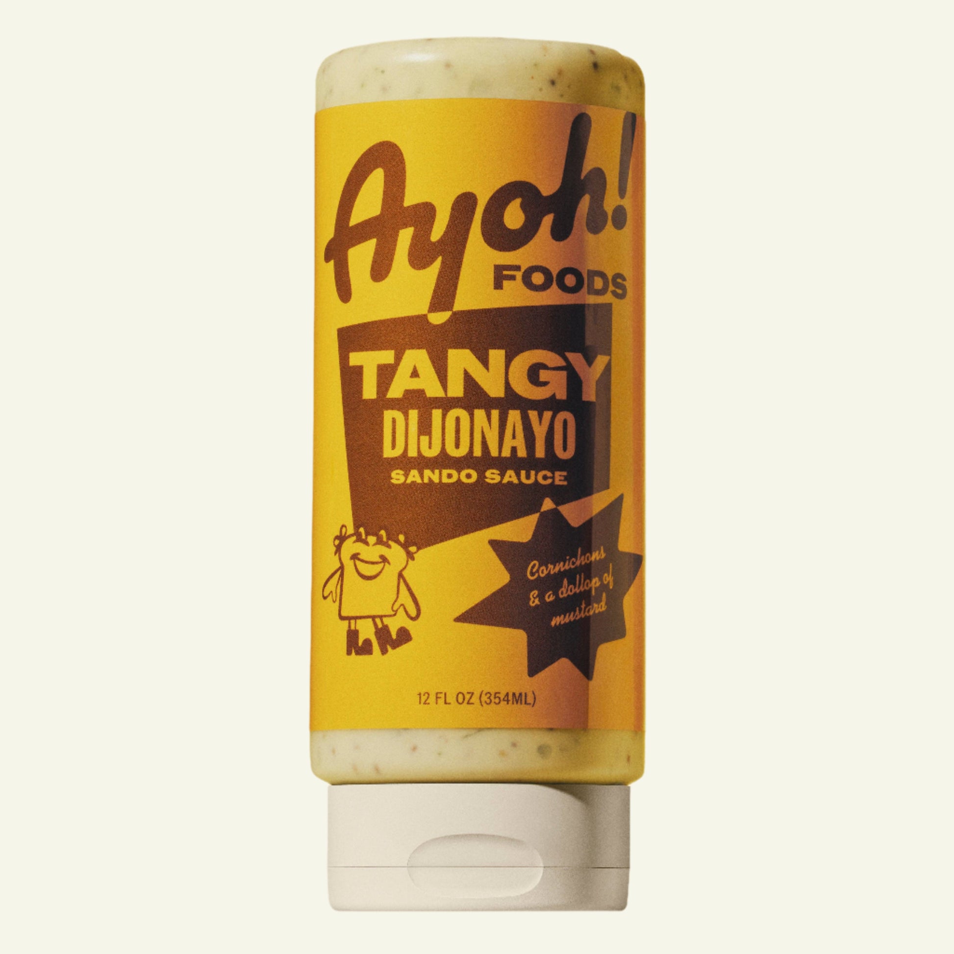 A bottle of Tangy Dijonayo sandwhich sauce with a yellow label, branded by Ayoh Foods, containing 12 fl oz.