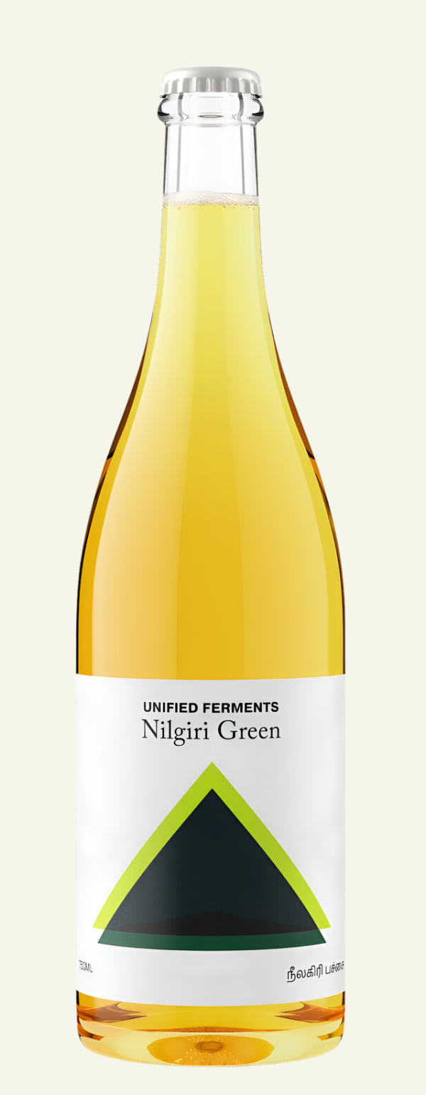 Bottle of Unified Perpetuums Nilgiri Green wine on a white background