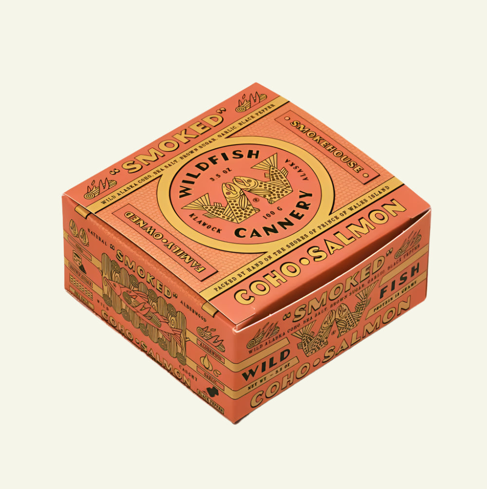 Box of Wildfish Cannery smoked coho salmon on a beige background