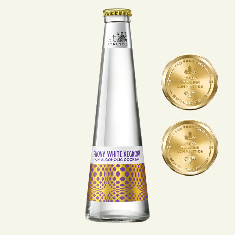 Clear bottle with gold cap and label on a white background