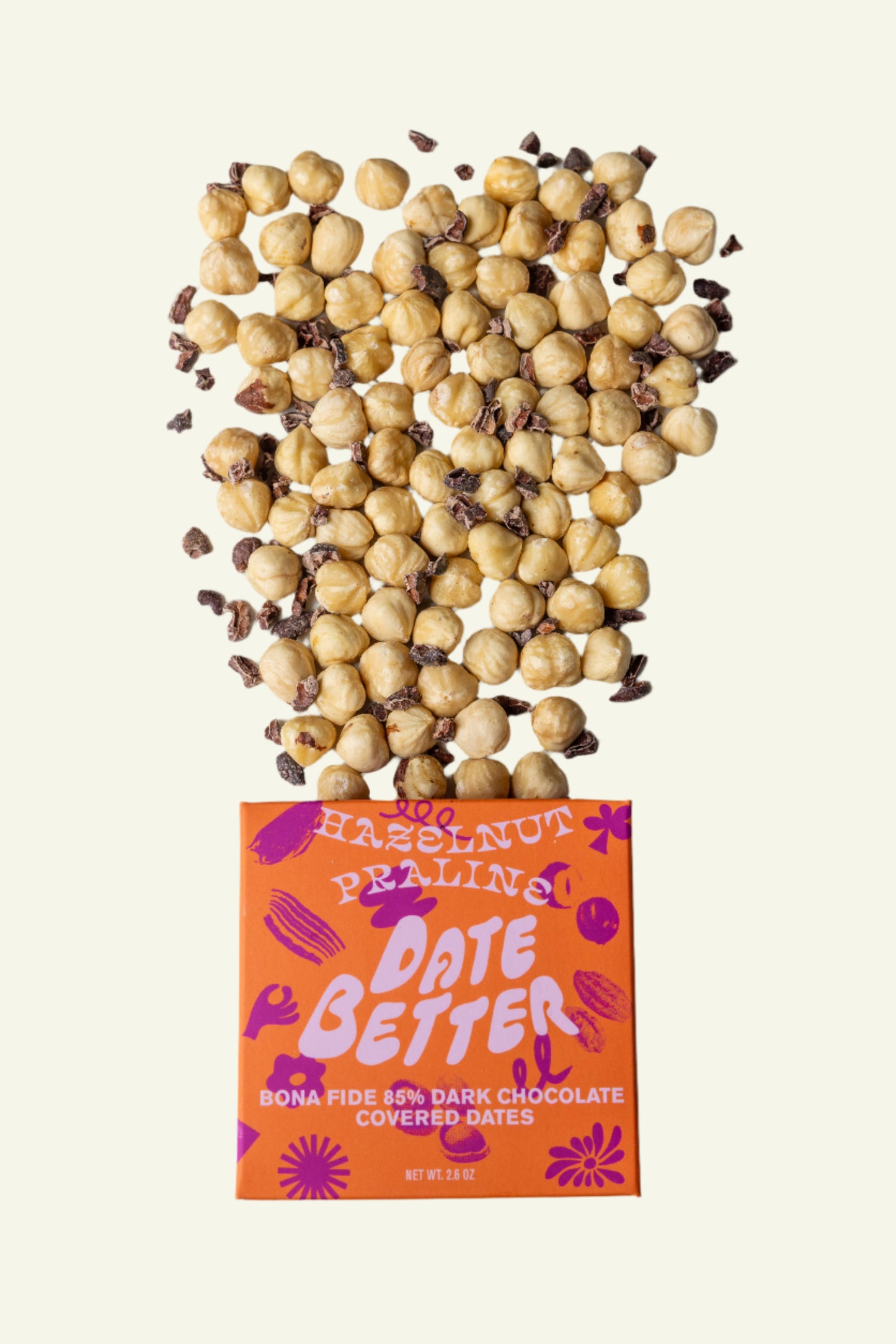 Box of 'Date Better' chocolate-covered dates with hazelnuts on top
