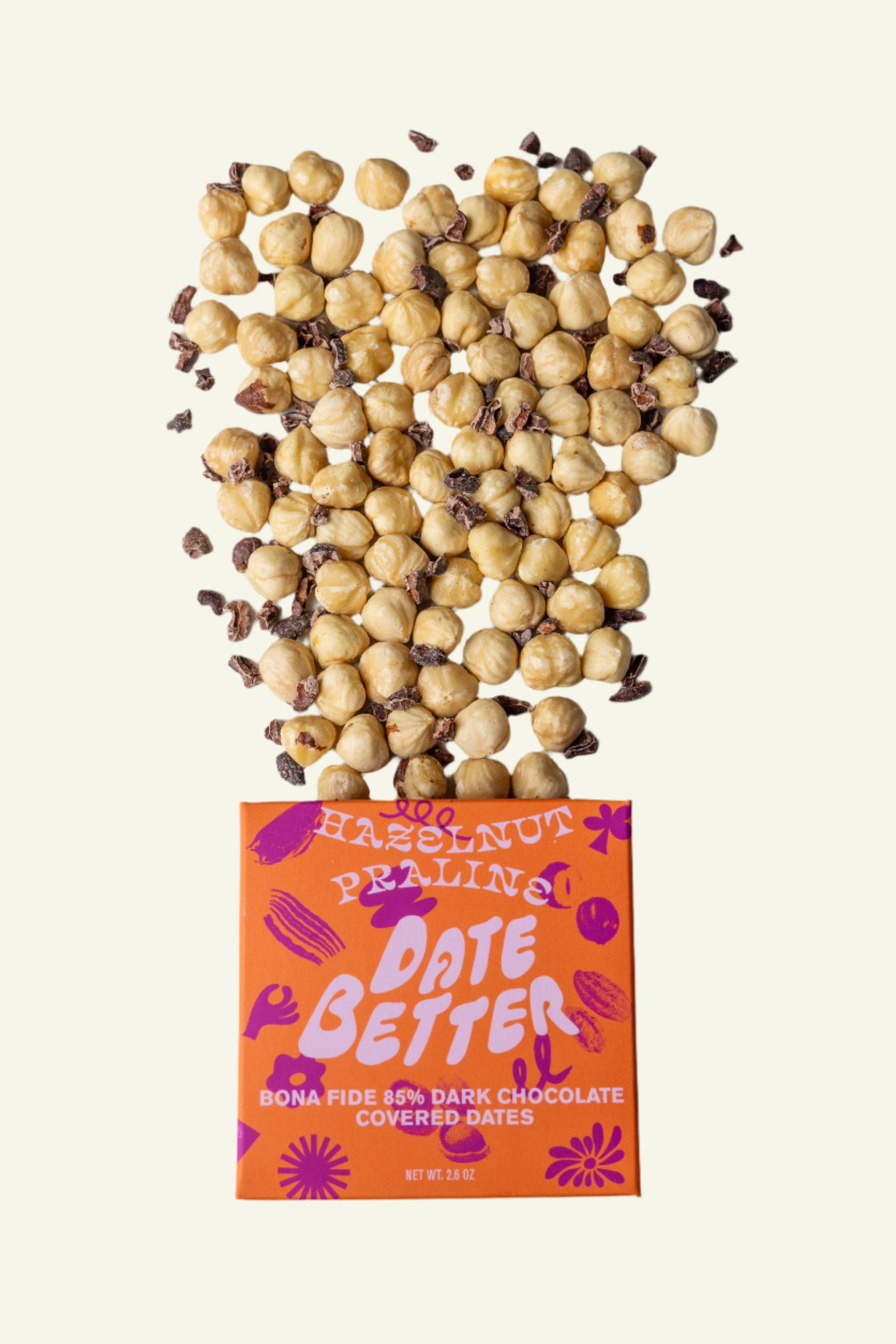 Box of 'Date Better' chocolate-covered dates with hazelnuts on top