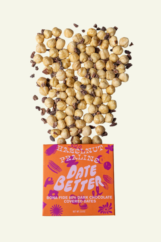 Box of 'Date Better' chocolate-covered dates with hazelnuts on top