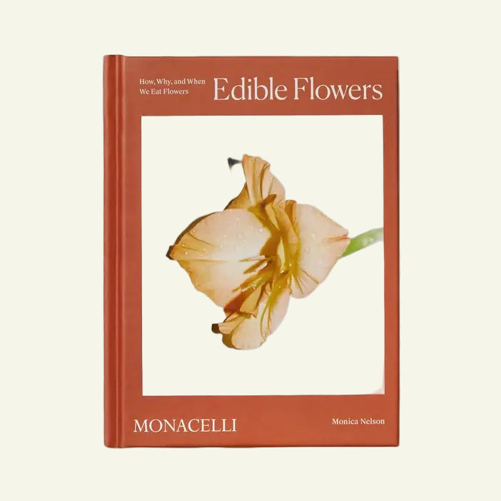 Book titled 'Edible Flowers' by Monacelli on a white background