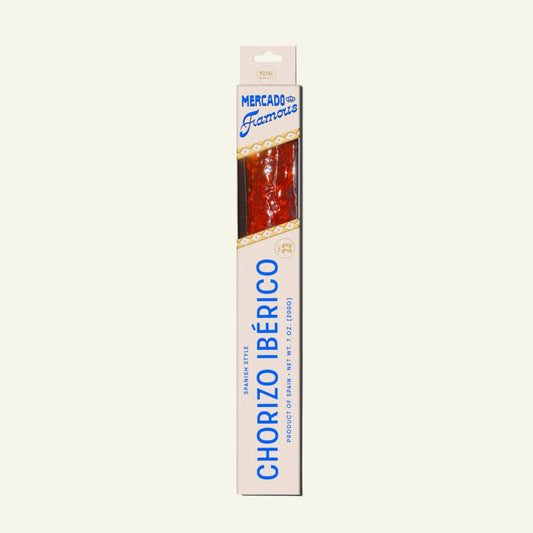 Packaged chorizo Bérico with Mercado de las Palmas branding on a light beige background