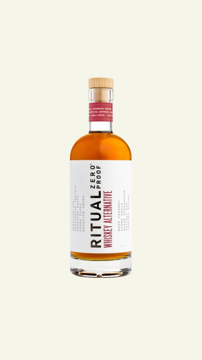Bottle of Ritual Zero Proof Whiskey Alternative on a white background
